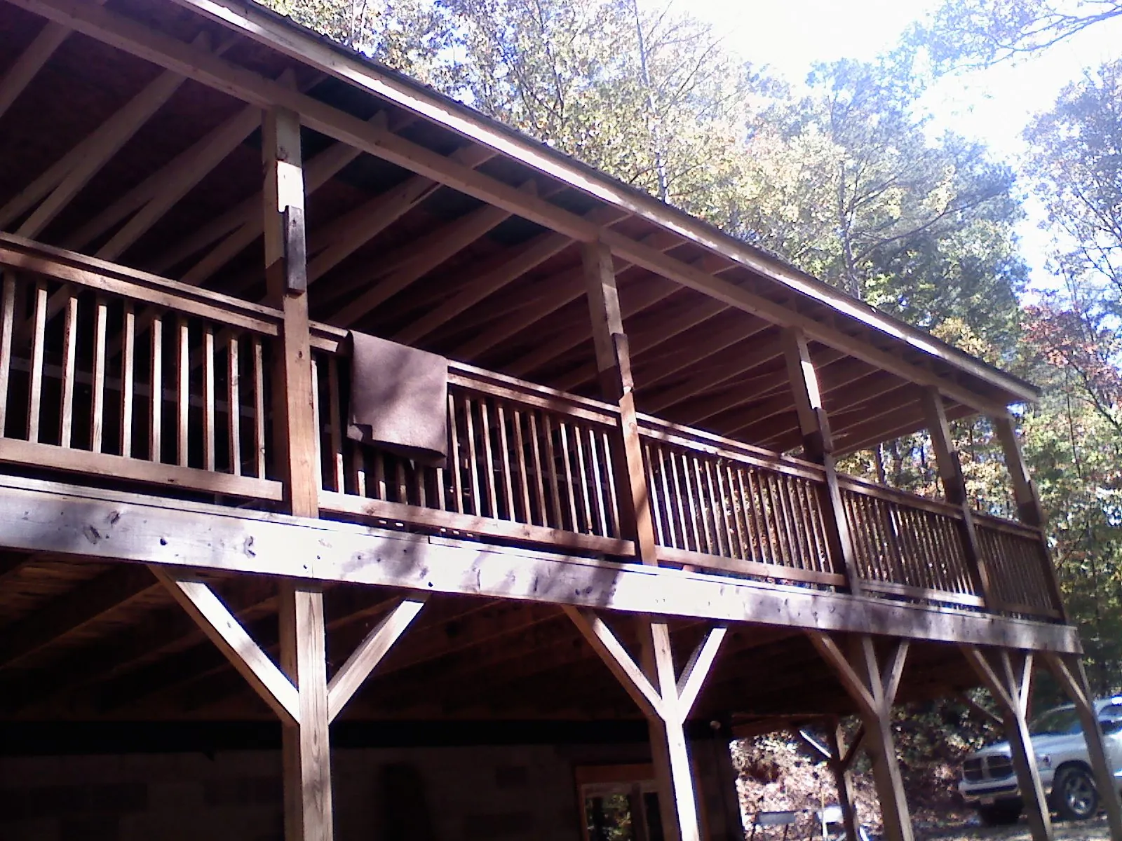 Timber framing under a new elevated porch and deck — Roof Leak Repair in Broomfield by Roofing Brothers
