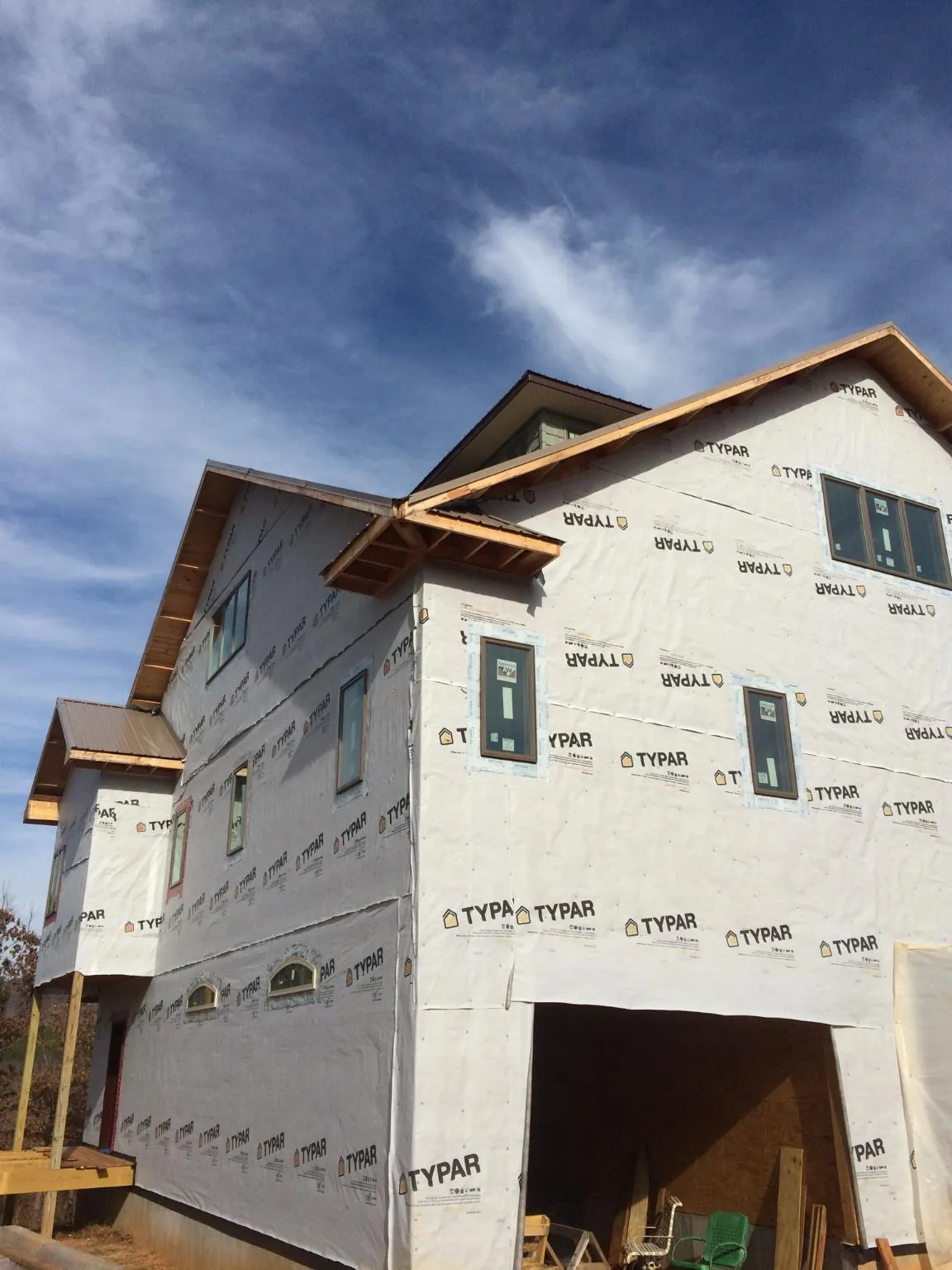 Stick built house wrapped in Typar with new roof framing and dormers in Broomfield